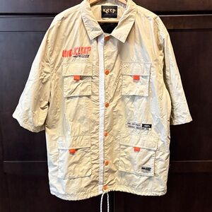 Kleep Love to Kleep Beige Utility Jacket with Orange details. Button down B1